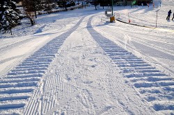 tire tracks in the snow image